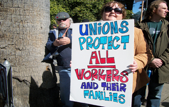 pro-union demonstrator holds sign 
